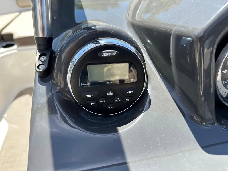 Slide: The Image of Jensen audio system on 2017 Bayliner VR5 Bowrider dashboard, featuring Bluetooth connectivity. - 25