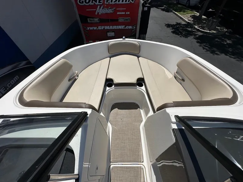 Slide: The Image of 2017 Bayliner VR5 Bowrider boat interior with beige seating and spacious layout. - 28