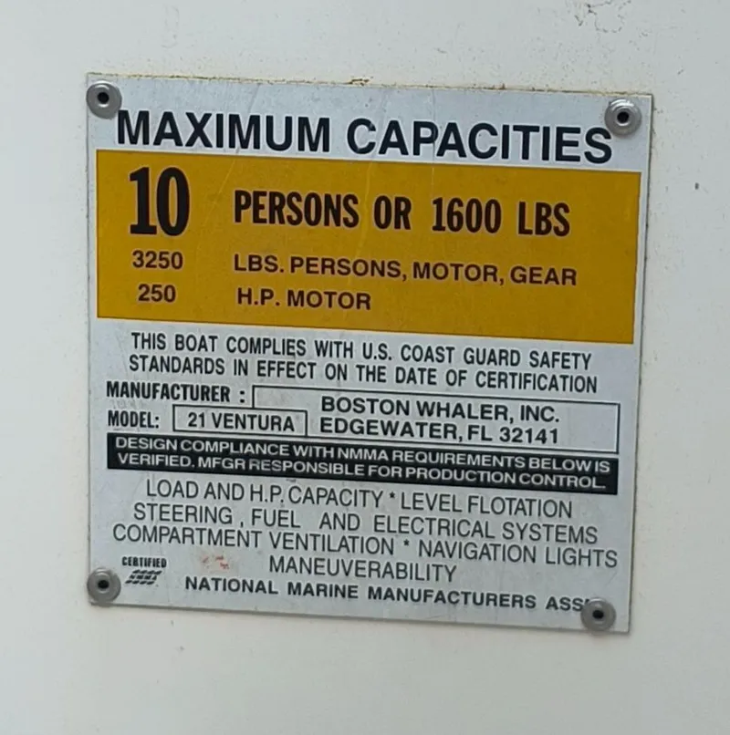 Slide: The Image of Capacity label for 2001 Boston Whaler 210 Ventura, 10 persons or 1600 lbs, 250 HP motor. - 21
