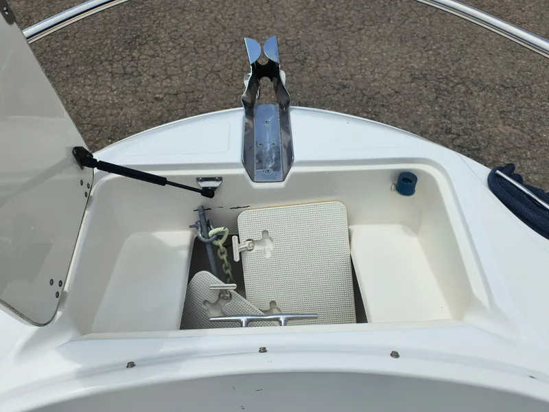 Slide: The Image of Open anchor compartment on a 2001 Boston Whaler 210 Ventura boat. - 5
