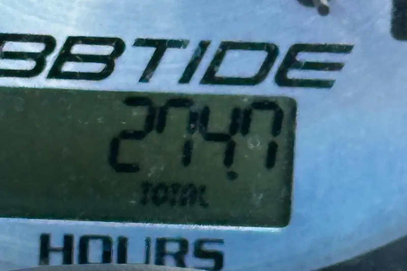 Slide: The Image of Close-up of Ebbtide 2460 SS Fun Cruiser DC 2007 hour meter displaying 274.7 hours. - 22