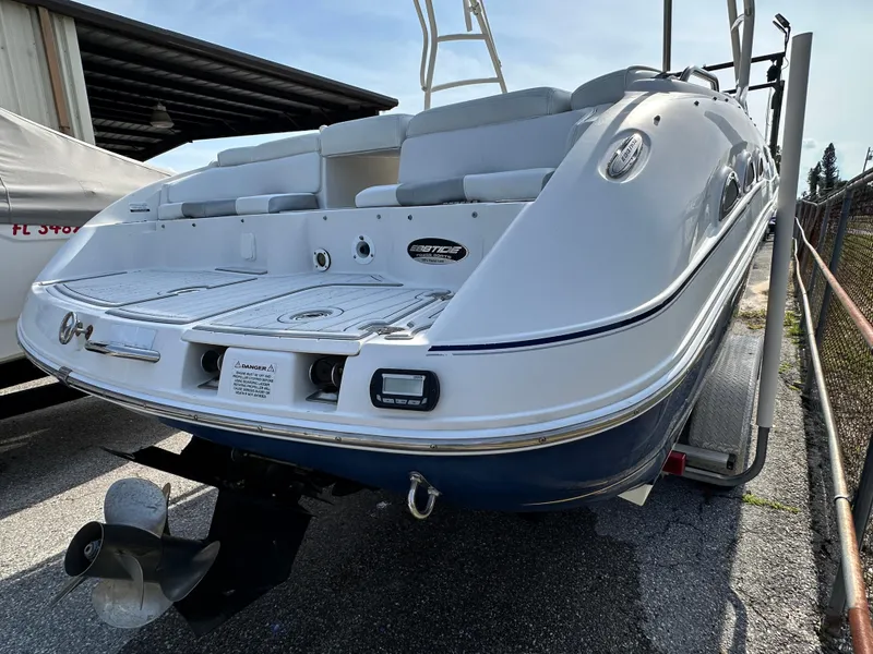 Slide: The Image of 2007 Ebbtide 2460 SS Fun Cruiser DC boat on trailer, rear view. - 5