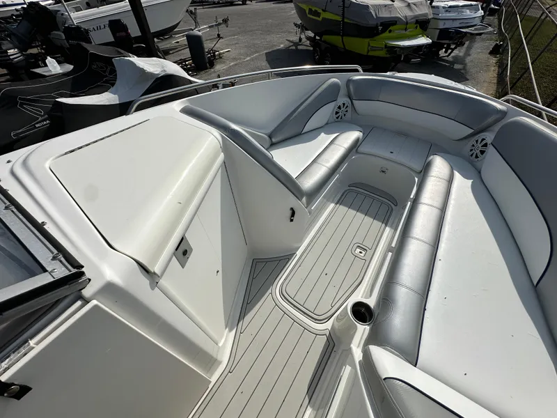 Slide: The Image of 2007 Ebbtide 2460 SS Fun Cruiser DC boat interior with spacious seating and sleek design. - 9