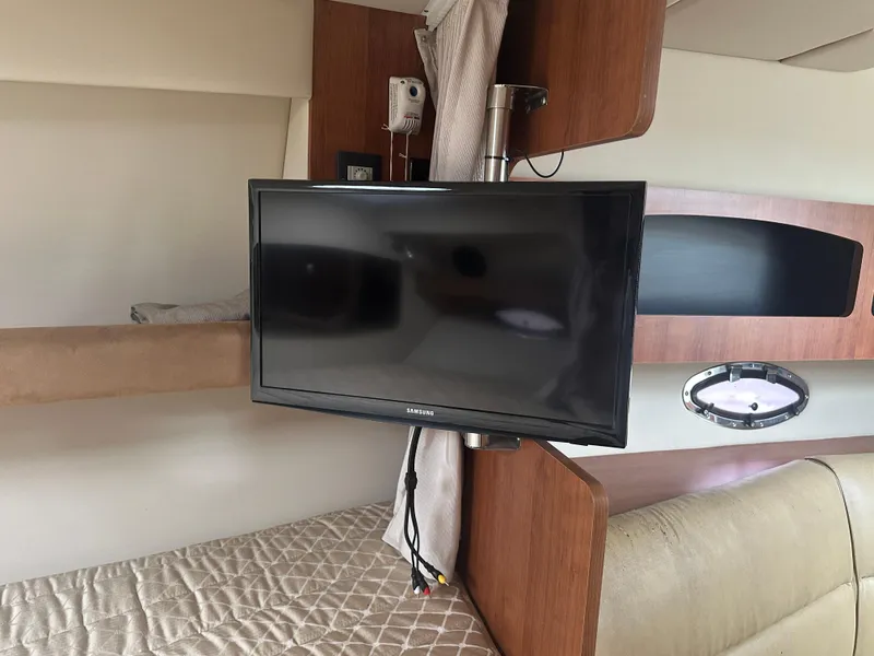 Slide: The Image of Interior of 2009 Cruisers 300 CXi Express with mounted Samsung TV. - 12