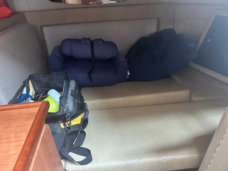 Slide: The Image of 2009 Cruisers 300 CXi Express cabin interior with bags and cushions. - 13