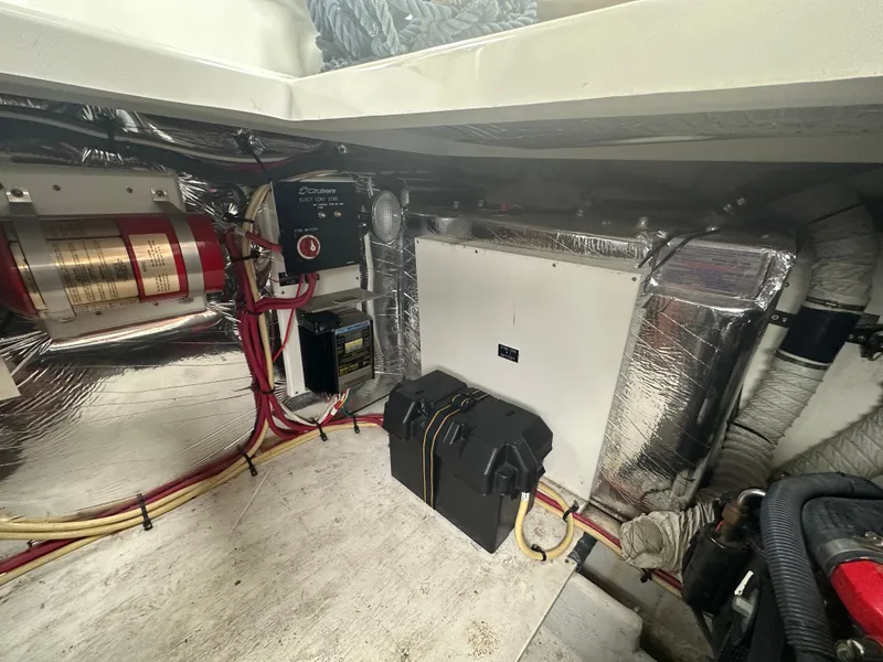 Slide: The Image of Engine room of 2009 Cruisers 300 CXi Express with wiring and equipment. - 21