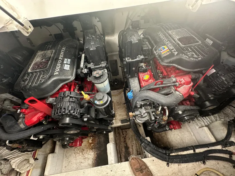 Slide: The Image of Twin Volvo Penta engines in a 2009 Cruisers 300 CXi Express boat. - 26