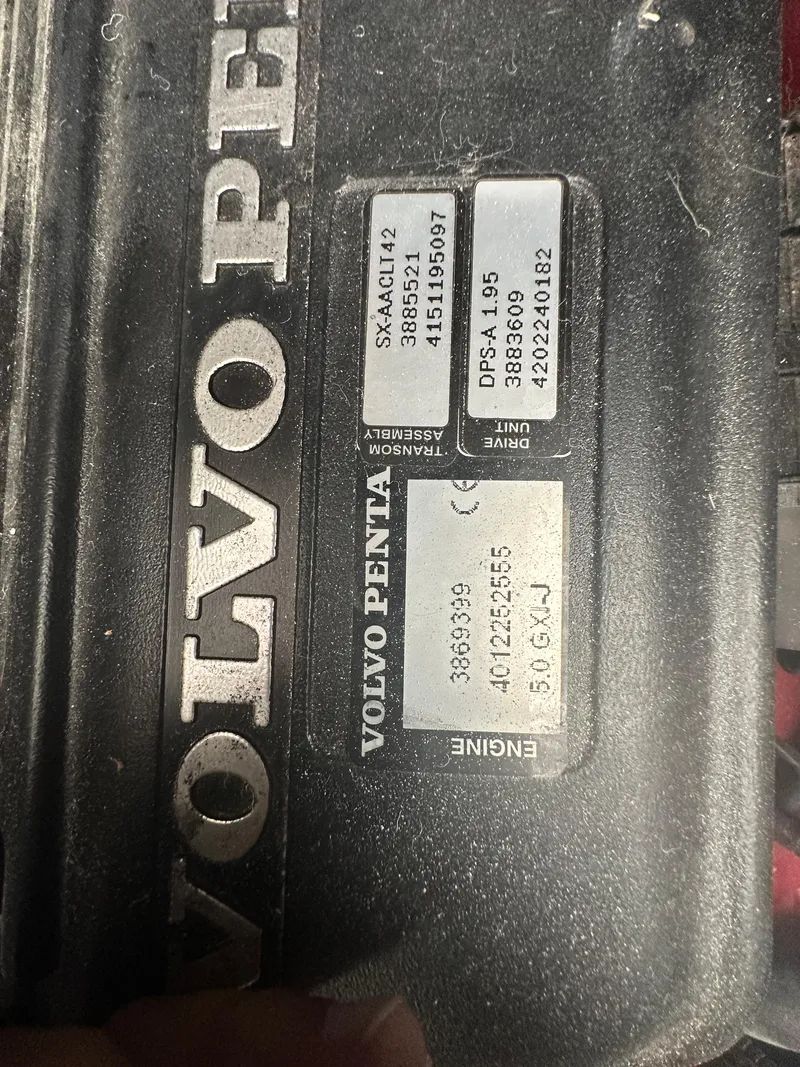 Slide: The Image of Volvo Penta engine labels on a 2009 Cruisers 300 CXi Express. - 27