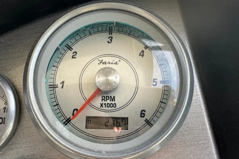 Slide: The Image of Tachometer of 2009 Cruisers 300 CXi Express showing 2167 RPM. - 34