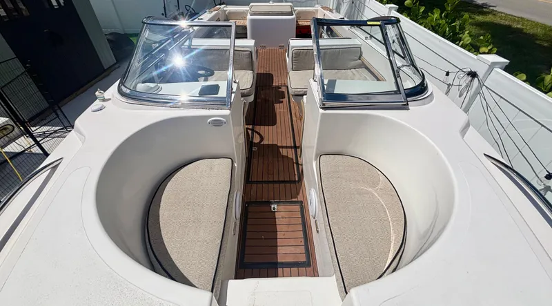 Slide: The Image of 2010 Westport 23 Custom Tender with spacious seating and sleek design. - 10
