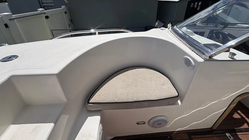 Slide: The Image of Westport 23 Custom Tender 2010 boat interior with cushioned seating and sleek design. - 12