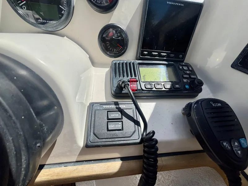 Slide: The Image of Control panel of a 2010 Westport 23 Custom Tender with Volvo Penta instruments. - 20