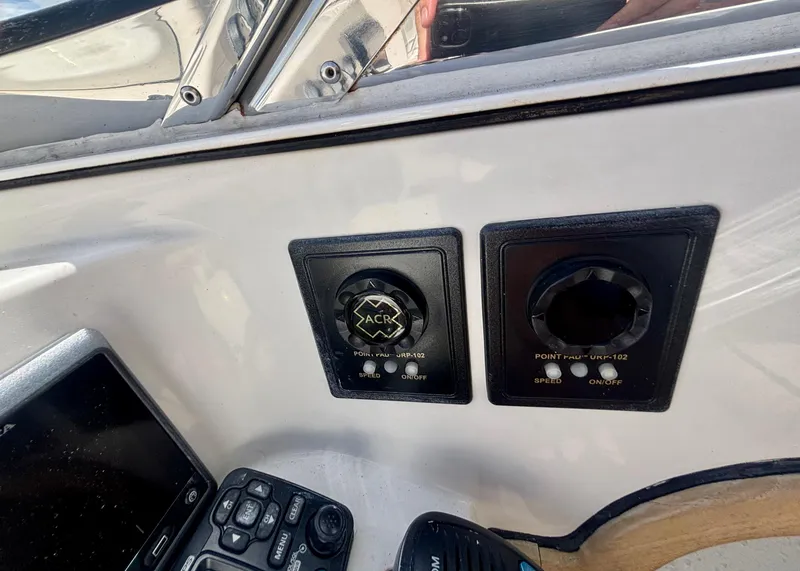 Slide: The Image of Control panel of a 2010 Westport 23 Custom Tender boat with navigation equipment. - 21