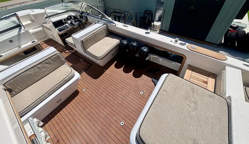 Slide: The Image of 2010 Westport 23 Custom Tender with spacious seating and teak flooring. - 25