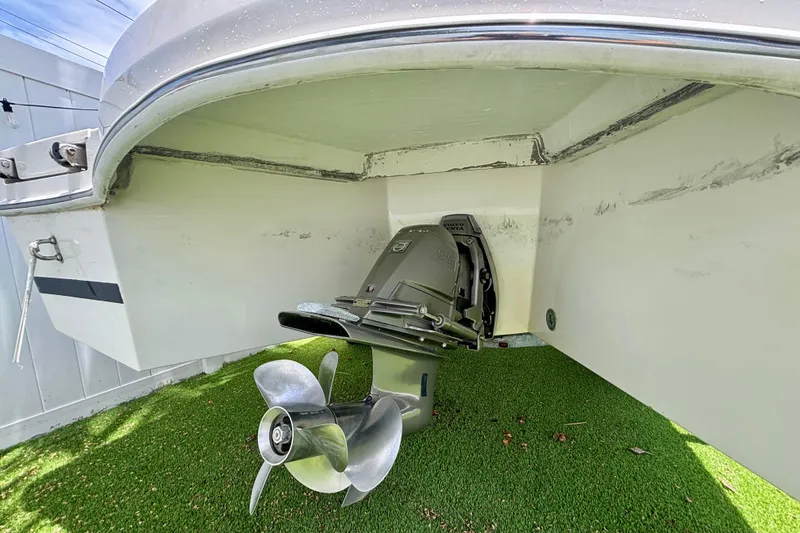 Slide: The Image of 2010 Westport 23 Custom Tender boat propeller and engine detail. - 7