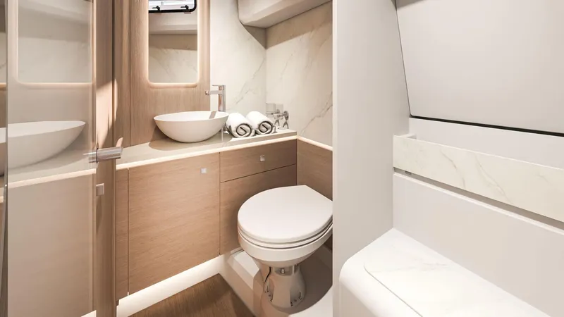 Slide: The Image of Luxurious bathroom in 2026 Beneteau Gran Turismo 35 yacht, featuring modern fixtures and elegant design. - 10
