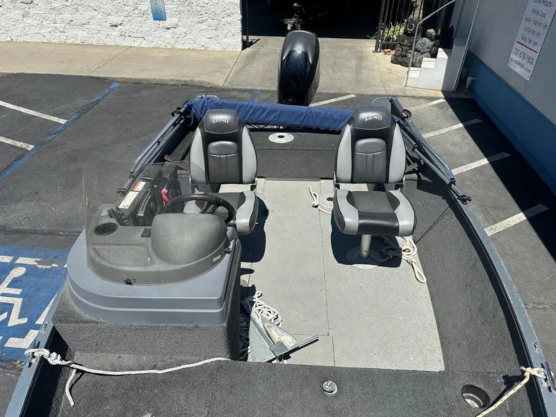 Slide: The Image of 2015 Lund 1625 Fury XL SS boat with dual seats and steering console. - 22