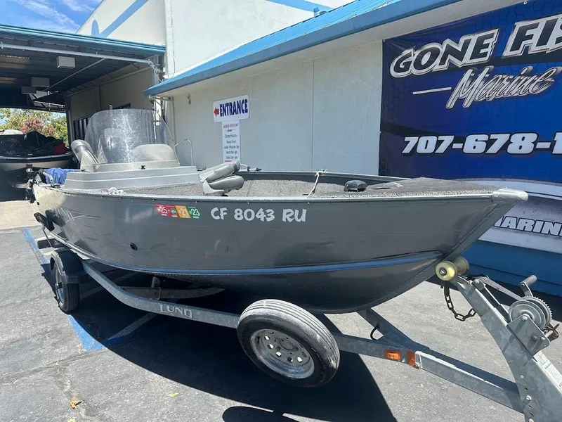 Slide: The Image of 2015 Lund 1625 Fury XL SS boat on trailer at Gone Fishin' Marine. - 5