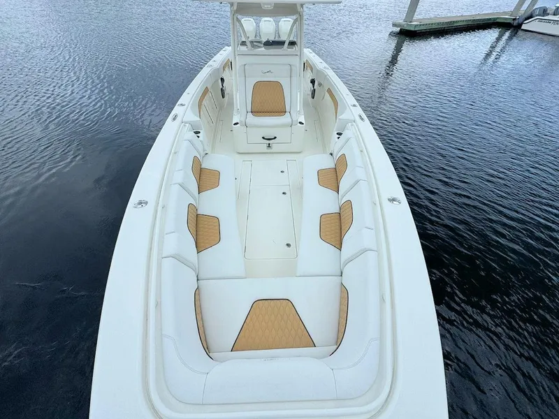 Slide: The Image of 2021 Blackwater 36 Sport boat with triple Mercury engines on open sea. - 14