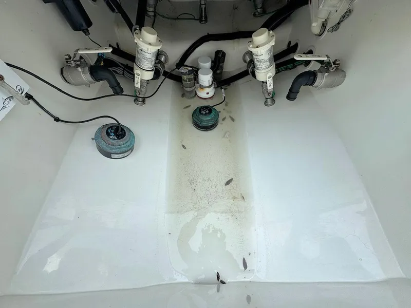 Slide: The Image of 2021 Blackwater 36 Sport boat with triple Mercury outboard engines on water. - 16