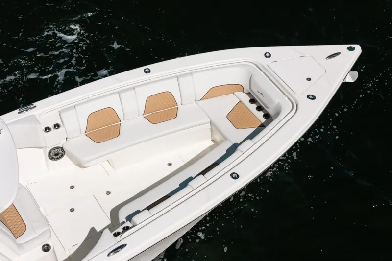 Slide: The Image of 2021 Blackwater 36 Sport boat with spacious seating and sleek design on water. - 22