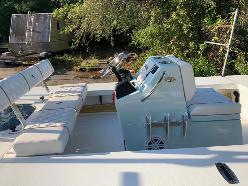 Slide: The Image of 2022 Beavertail Skiffs Vengeance boat interior with steering console and seating. - 16
