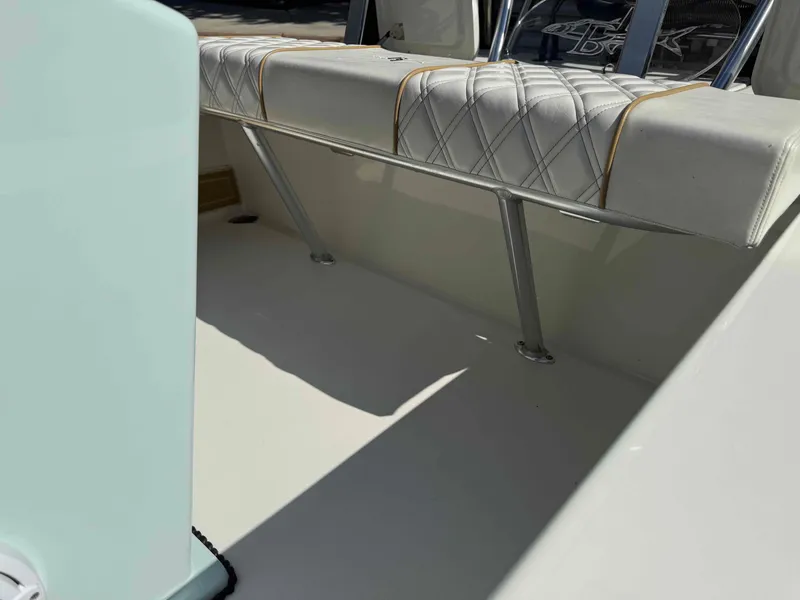 Slide: The Image of 2022 Beavertail Skiffs Vengeance interior with cushioned seating and sleek design. - 18