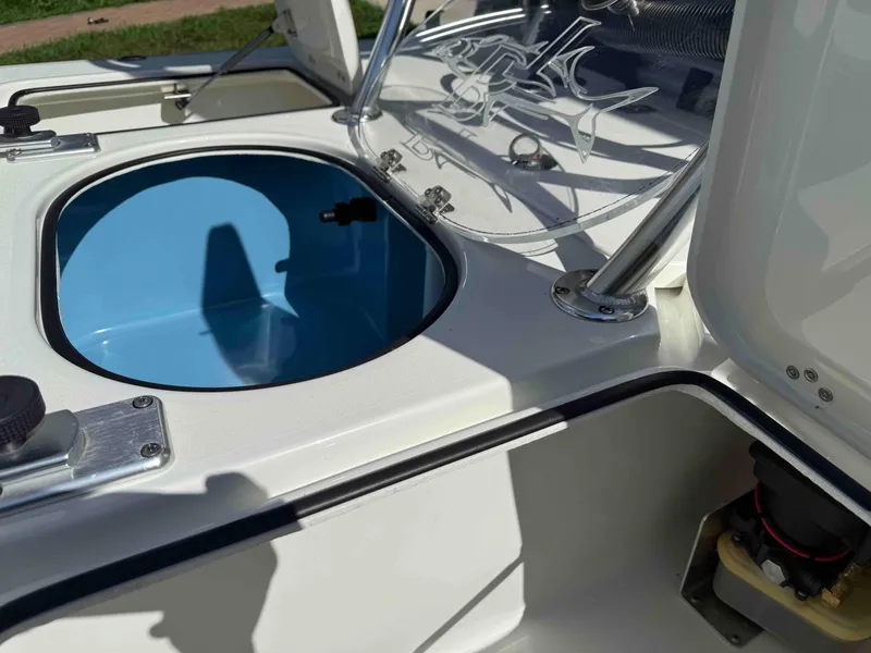 Slide: The Image of 2022 Beavertail Skiffs Vengeance boat interior with open storage compartments. - 23