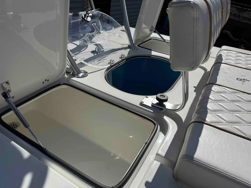 Slide: The Image of 2022 Beavertail Skiffs Vengeance boat interior with storage compartments and seating. - 24