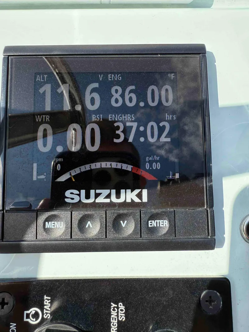Slide: The Image of Suzuki engine display on 2022 Beavertail Skiffs Vengeance boat dashboard. - 26