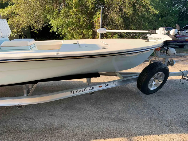 Slide: The Image of 2022 Beavertail Skiffs Vengeance boat on trailer, parked outdoors. - 4