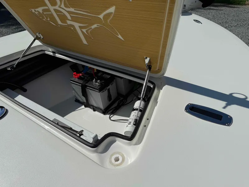 Slide: The Image of 2022 Beavertail Skiffs Vengeance boat compartment with battery and hydraulic lift. - 8