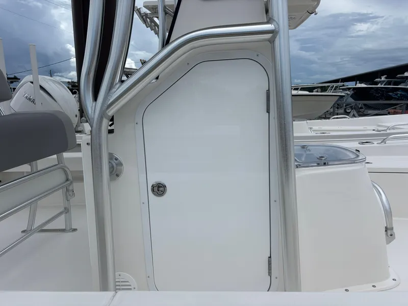 Slide: The Image of 2026 Bay Rider 219 Bay boat with Yamaha engines and sleek seating design. - 10