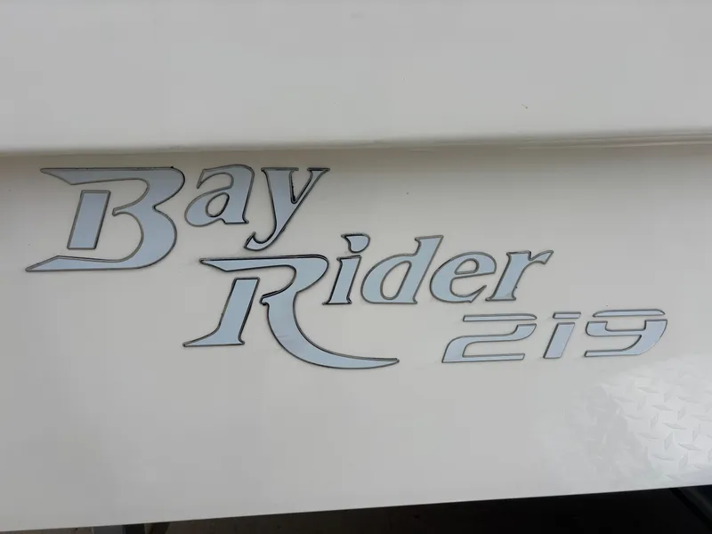 Slide: The Image of Bay Rider 219 Bay 2026 model logo on boat exterior. - 3