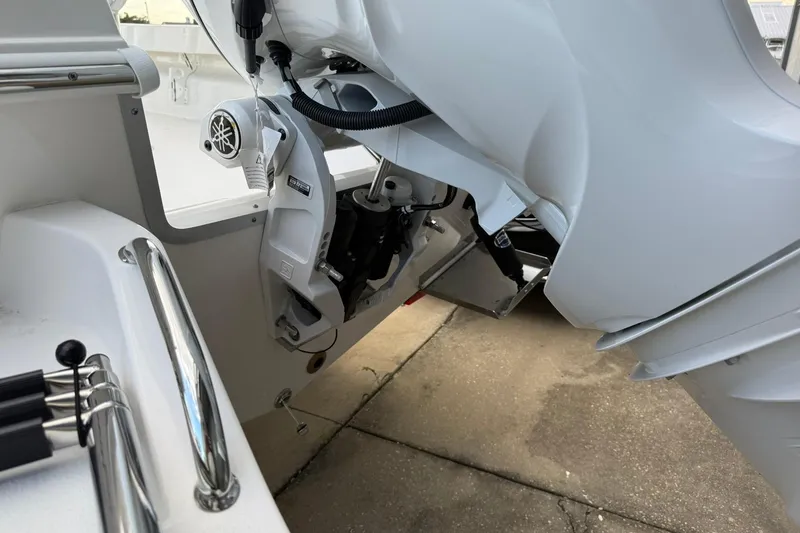 Slide: The Image of 2026 Bay Rider 219 Bay boat engine and controls, showcasing modern design and technology. - 30