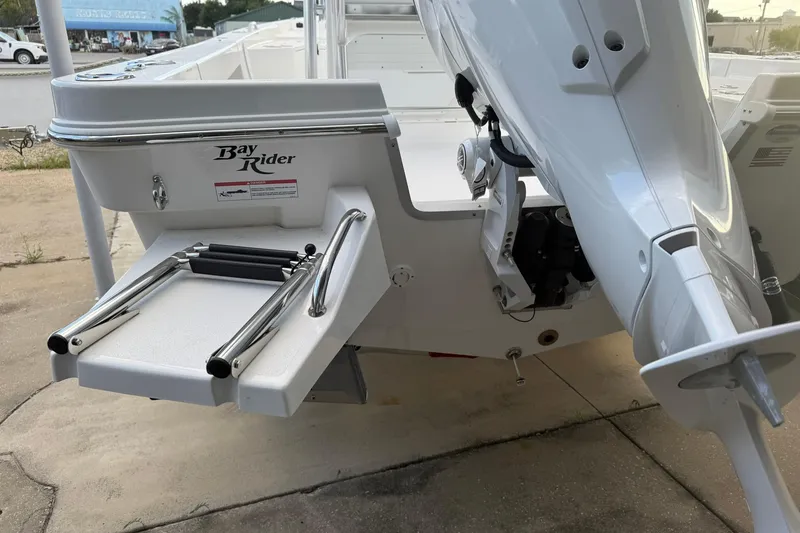 Slide: The Image of 2026 Bay Rider 219 Bay boat with motor and swim ladder. - 31