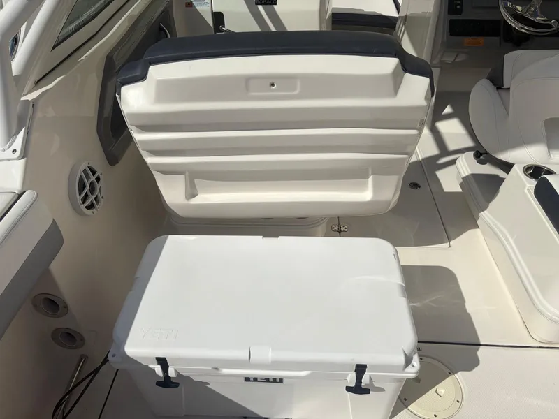 Slide: The Image of 2021 Robalo R247 Dual Console with twin Yamaha 200 engines, rear view. - 20