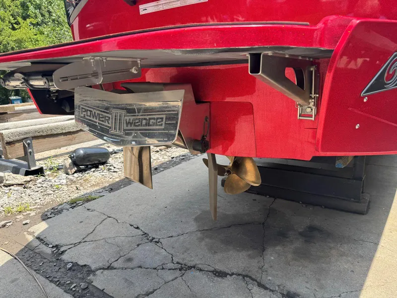 Slide: The Image of Rear view of a 2022 Axis T250 boat with Power Wedge III feature. - 11
