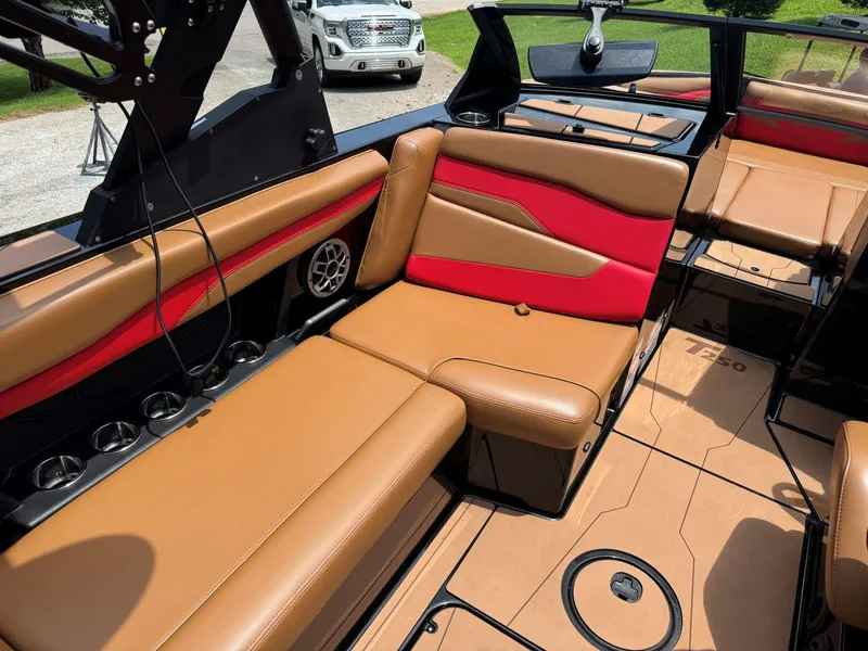 Slide: The Image of Luxurious interior of 2022 Axis T250 boat with tan and red seating. - 17