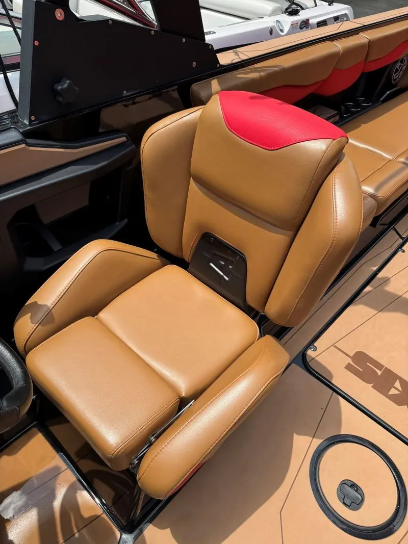 Slide: The Image of Brown and red seat in 2022 Axis T250 boat interior. - 32