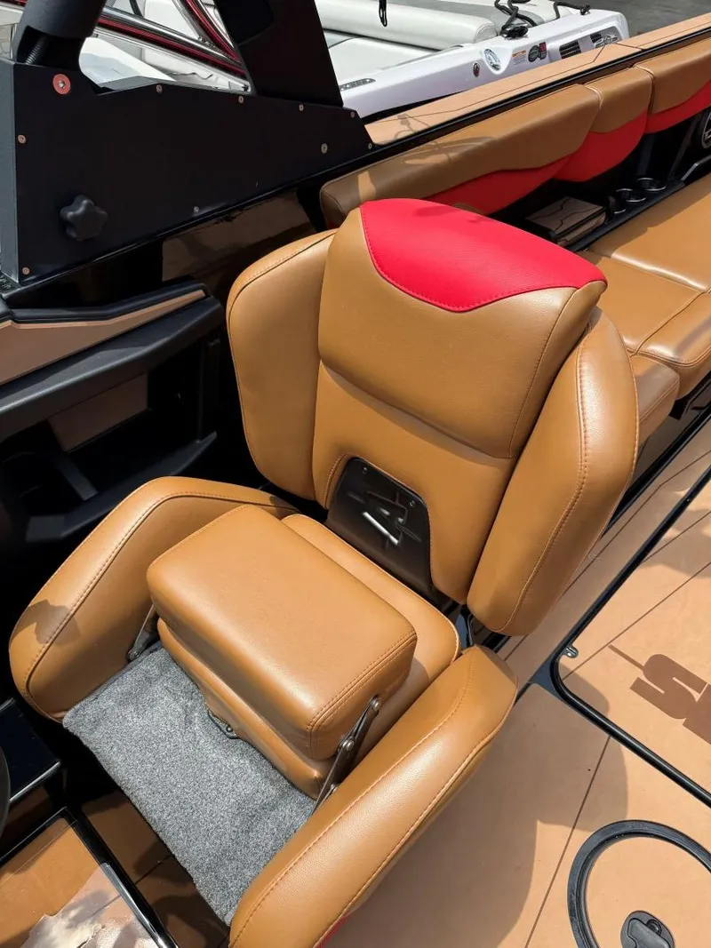 Slide: The Image of 2022 Axis T250 boat interior with tan and red leather seating. - 33