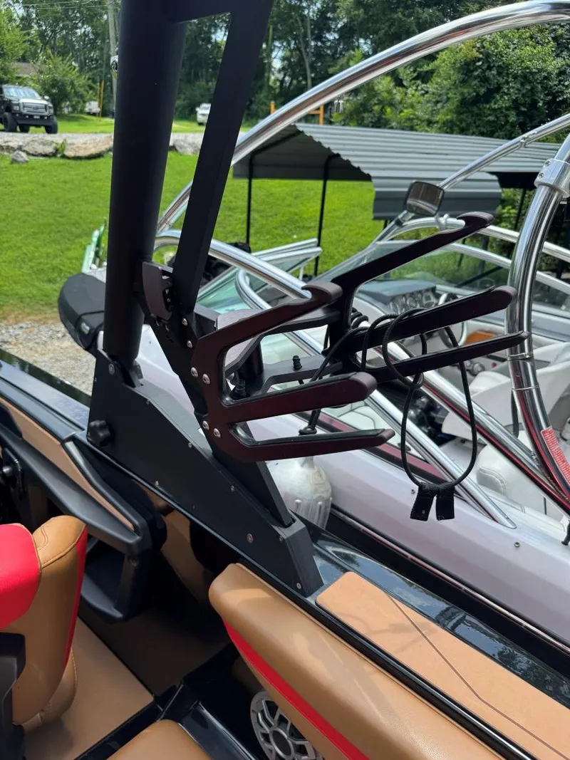 Slide: The Image of 2022 Axis T250 boat interior with wakeboard rack and seating. - 38