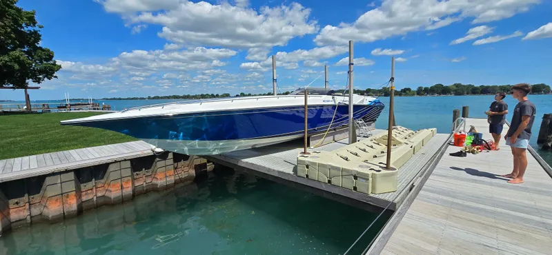 Slide: The Image of 2007 Fountain 42 Executioner speedboat docked on a sunny day with clear skies. - 3