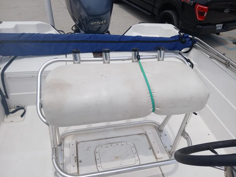 Slide: The Image of 2005 Skeeter ZX 2200 boat interior with Yamaha 250 engine and rod holders. - 12