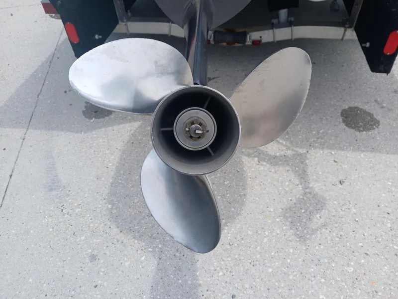 Slide: The Image of Propeller of a 2005 Skeeter ZX 2200 boat on a concrete surface. - 17