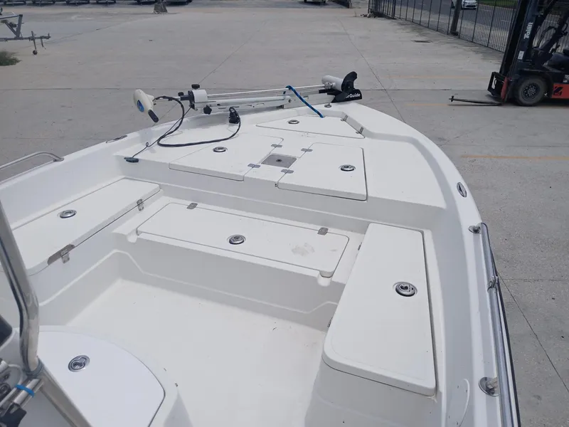 Slide: The Image of 2005 Skeeter ZX 2200 boat deck with storage compartments and trolling motor. - 8
