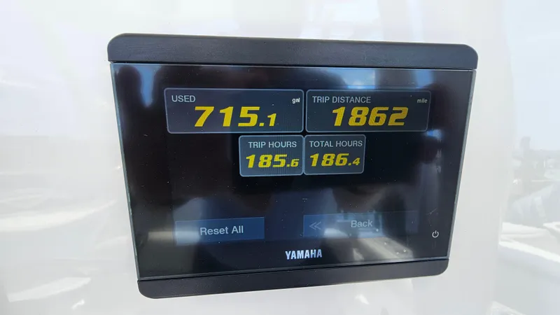 Slide: The Image of Yamaha display showing fuel usage, trip distance, and hours on a 2022 Sea Fox 249 Avenger. - 12