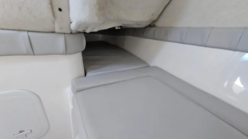 Slide: The Image of Interior cabin of 2022 Sea Fox 249 Avenger boat with cushioned seating. - 20