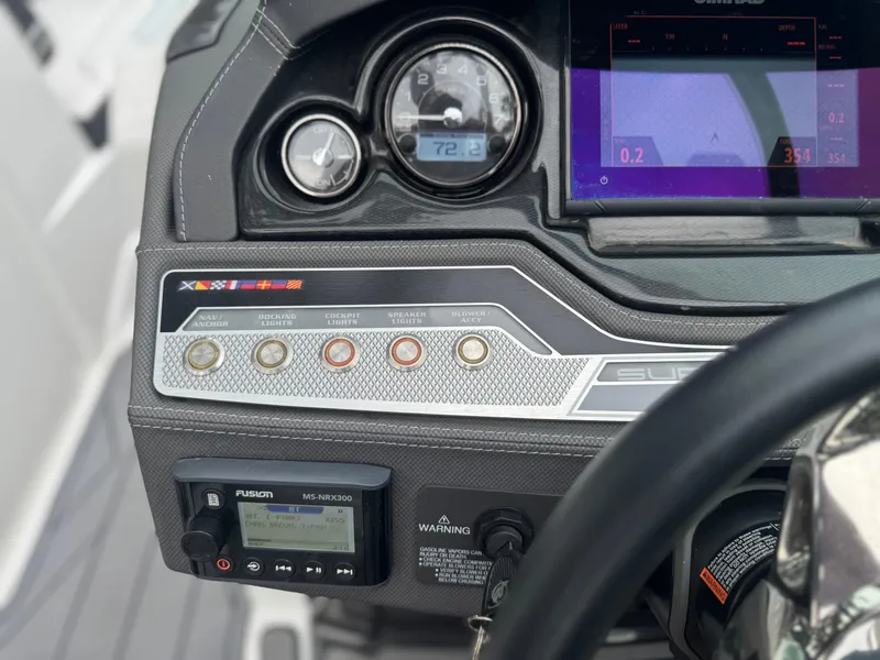 Slide: The Image of Dashboard of 2022 Monterey 278SS Super Sport boat with control panel and gauges. - 11