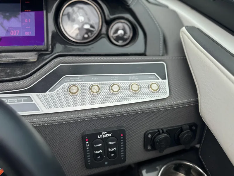 Slide: The Image of Dashboard controls of 2022 Monterey 278SS Super Sport boat, featuring buttons and gauges. - 12